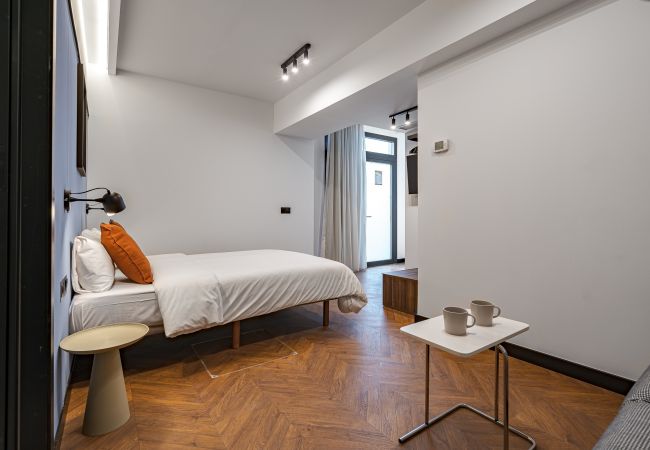 Quarto em Madrid - Style Suites - Triple Room